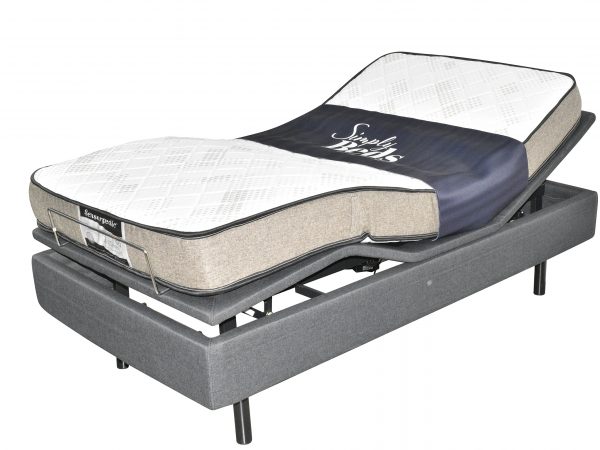 Adjustable bed with mattress